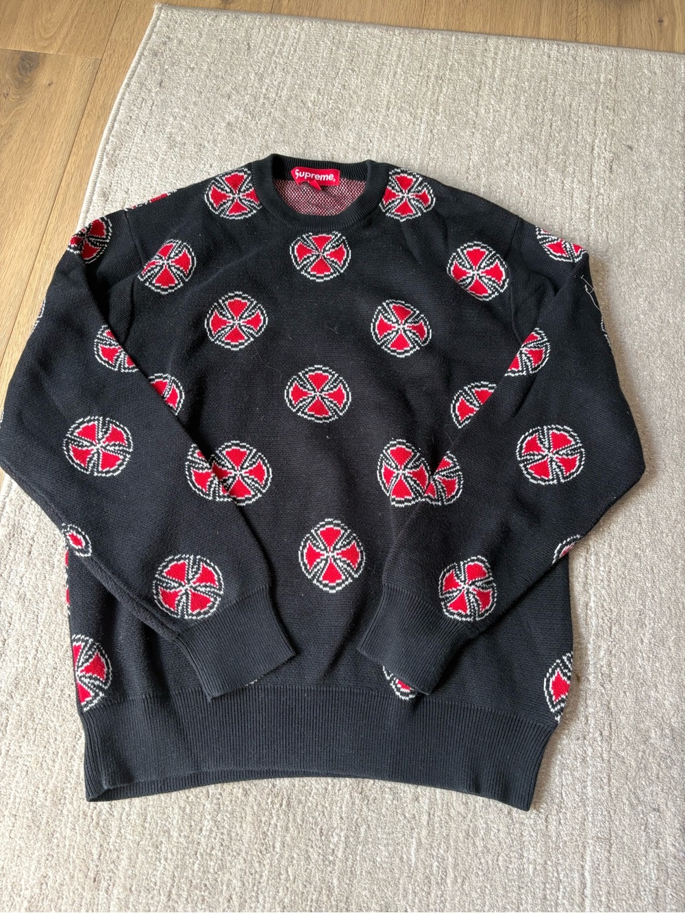 Supreme Black Crewneck Sweater with Red Motif